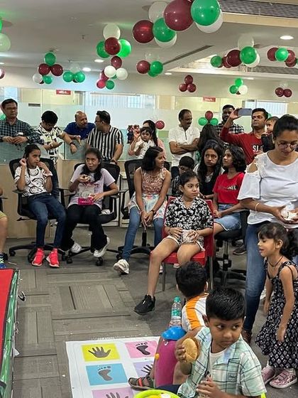 A wide view of my show at a corporate family day. You can see kids and parents alike are completely focused on the magic happening on stage. It's a great way to provide family friendly entertainment.