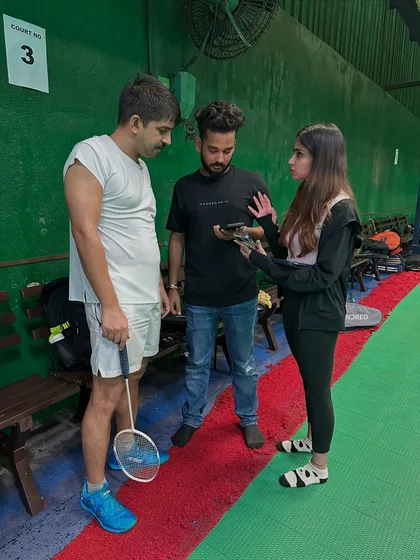 A player reviewing his real-time performance data with the Firstbeat team. This technology helps athletes understand their physical output during training.