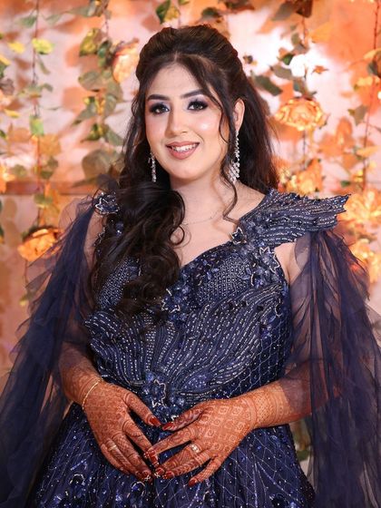 A portrait of the client in the navy gown, looking radiant. This is the kind of confidence I want every client to feel.