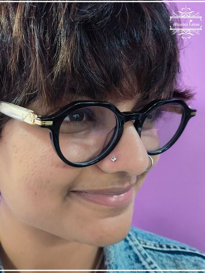 A new nose stud adds the perfect amount of bling. This client chose a square-cut gem for a unique and modern look.