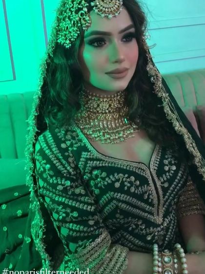 A close-up under green light, creating a very dramatic and moody effect.