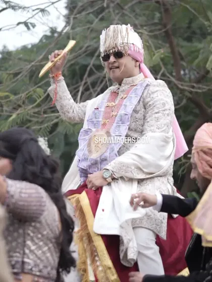 The groom, Rohan, enjoying the baraat procession on his way to the wedding venue.