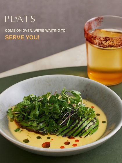 Our Torched Avocado Ceviche paired with a cocktail. A perfect example of our light, fresh, and inventive vegetarian offerings.