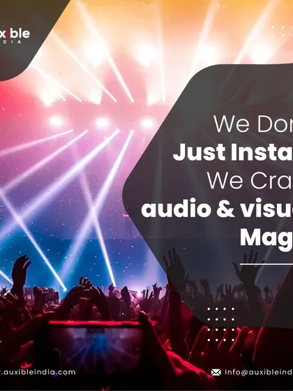 We do not just install, we craft audio and visual magic. This image of a crowd with hands in the air, bathed in dramatic stage lighting, embodies the captivating experiences we build.
