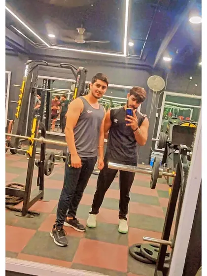 A picture with my brother at the gym. Fitness is a lifestyle that we share.