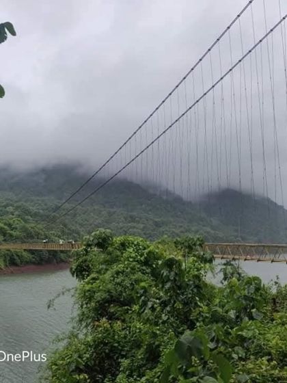 The scenic Shivapura Hanging Bridge, a key attraction on our Yallapura exploration trip, offering great views of the surrounding hills.