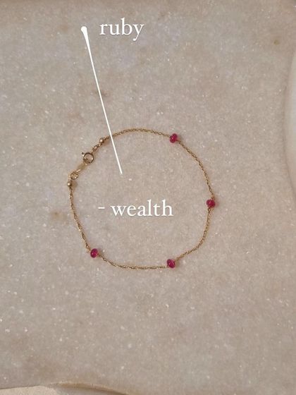 Another view of the Ruby Baati Bracelet, a stone of good fortune for the body, mind, and soul.