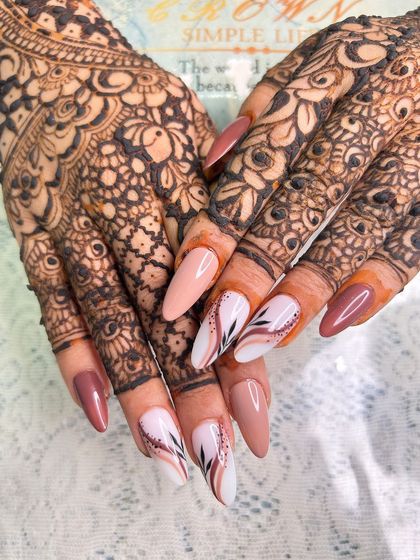 A stunning bridal nail set with intricate line work, created by a student. This showcases their ability to handle detailed and elegant designs for special occasions.
