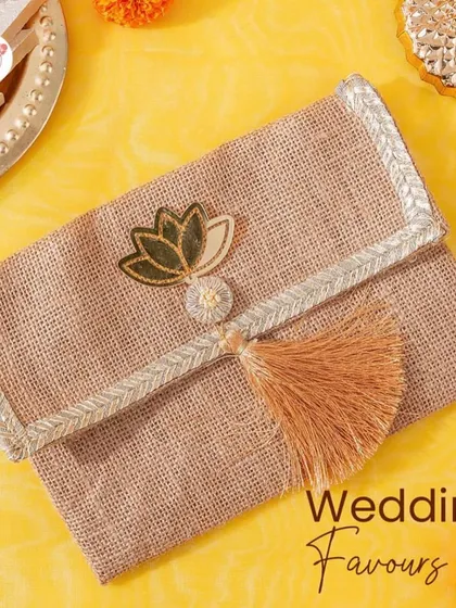 Another option for wedding favors, this jute clutch-style envelope is perfect for giving shagun or small gifts.