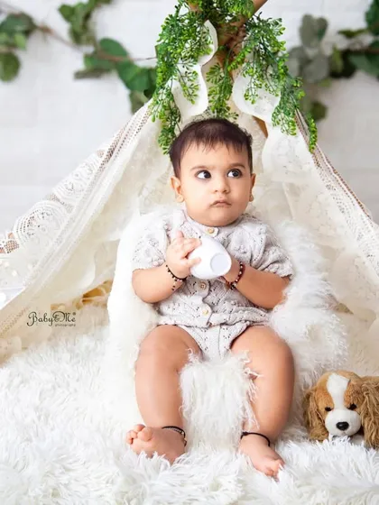 A thoughtful moment during his six-month session. I always aim to capture a variety of moods and expressions that show your baby's full personality.