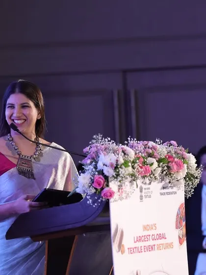 A happy moment on stage. Even in the most formal settings, I believe in bringing a touch of warmth and personality to my hosting.