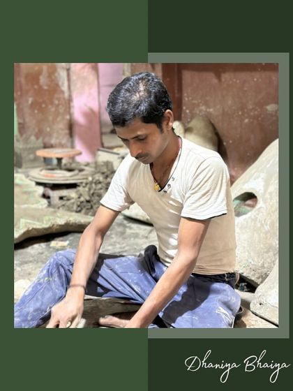 Dhaniya Bhaiya, a skilled craftsman, is seen here focused on his work. We are honored to collaborate with such dedicated individuals who bring generations of expertise to our project.