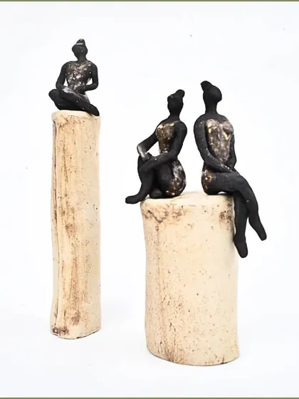 I call these my 'Pillars of Strength'. These small sculptures represent the courage and resilience we all have inside us. They are a reminder that we can adapt and stand tall through all of life's hurdles.