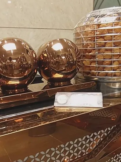 This unique spherical dispenser is part of our modern live counter setup. It keeps puris crisp and adds a touch of contemporary elegance to the traditional chaat station at your event.