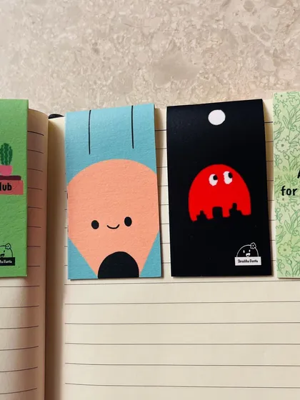 For all the book lovers, I made these magnetic bookmarks to save your page without damaging it. They have all sorts of punny, cute designs that clip right over your page and stay put.