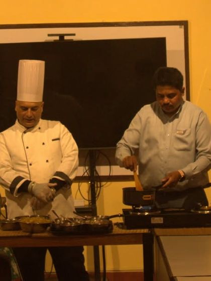 Guests watch attentively as our chef explains the properties of different ingredients during a live cooking demonstration. Learning about Ayurvedic food is an empowering part of the stay.