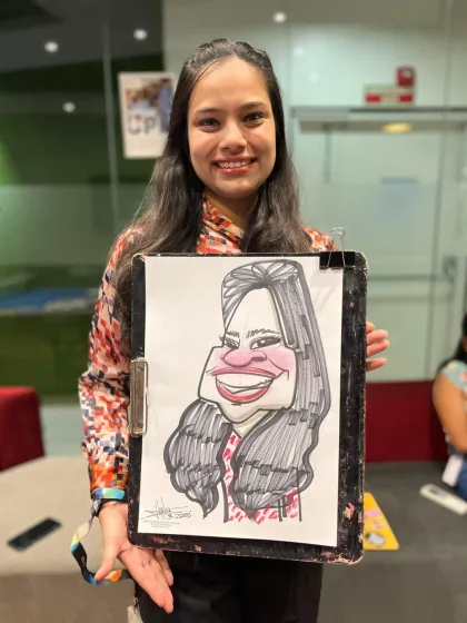 This guest's big smile was perfectly captured in her caricature. It was a day full of fun and appreciation.