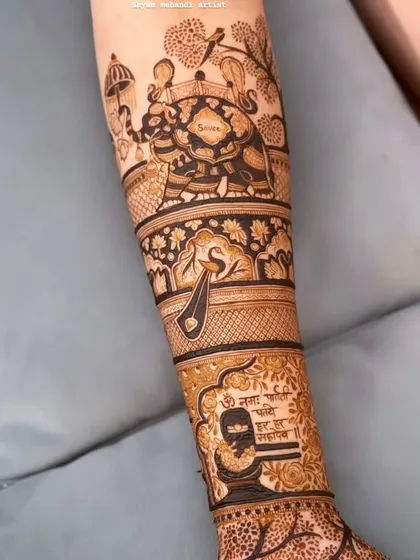 A unique design featuring a Shivling with mantras, a couple portrait, and an elephant with a howdah.