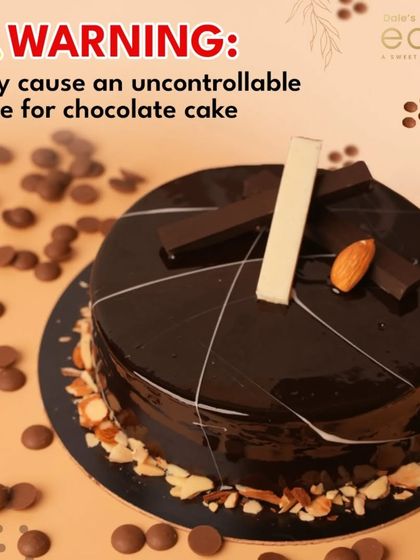 A warning for all chocolate lovers. This glossy, dark chocolate almond cake is so rich and tempting, it may cause an uncontrollable urge for a second slice.