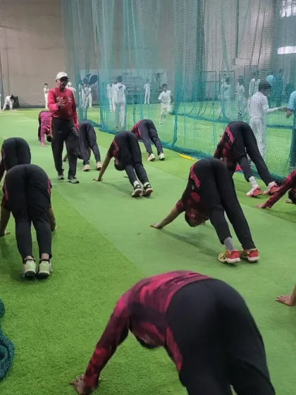 Discipline in form and posture during a downward dog pose in a yoga session. This builds both physical and mental resilience.