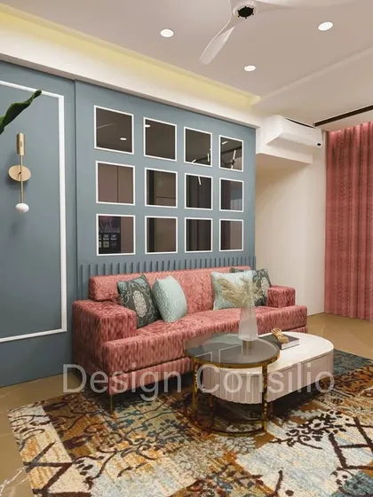 A close-up of the seating area, highlighting the mix of textures from the soft sofa, plush cushions, and patterned rug. We believe these details are what make a house feel like a home.