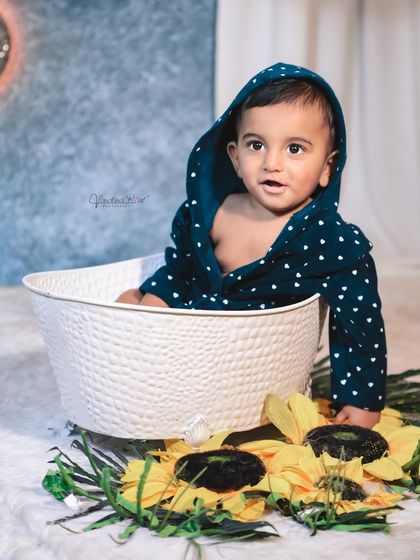 A collection of our fun and bubbly bathtub photos. This theme allows for playful and candid shots, with props like rubber ducks and cozy robes to complete the look.