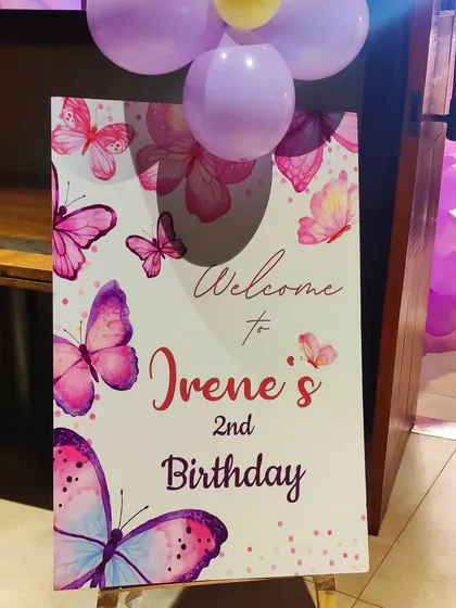 A personalized welcome sign for Irene's 2nd birthday, featuring a pretty butterfly design.