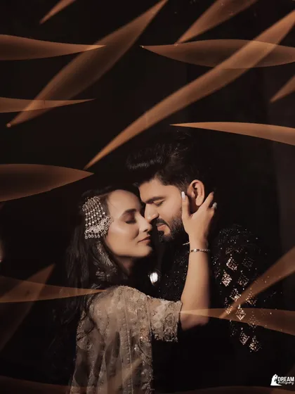 Love is found in the quiet moments. I use creative lighting and composition to create intimate couple portraits that feel like a scene from a movie. This portrait of Manya and Bharat captures the gentle connection and romance that defines their bond.