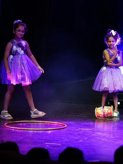 Our littlest performers stealing the show with their adorable Bollywood routine, complete with hoops and cute dresses.