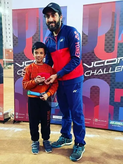 Our Director and Head Coach with a budding player at a Yonex VCORE Challenge event hosted at our academy. We provide opportunities for our students to try the latest equipment and engage with the broader tennis community.