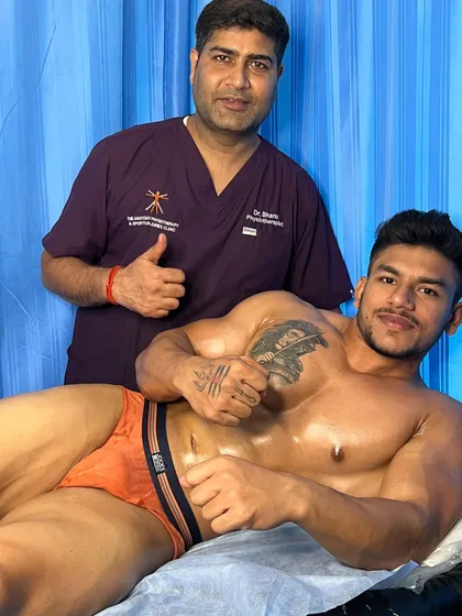 A thumbs-up from me and wrestler Ashwani after a great session.
