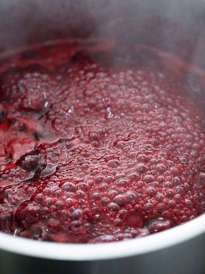 Crafting a vibrant berry compote from scratch, a fundamental skill for any professional pastry kitchen.