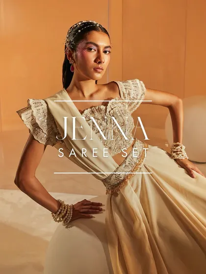My Jenna Saree Set gives a traditional concept an edgy, modern twist. It features a gorgeous embroidered blouse with structured shoulders and a pre-draped skirt secured with a highly embellished belt.