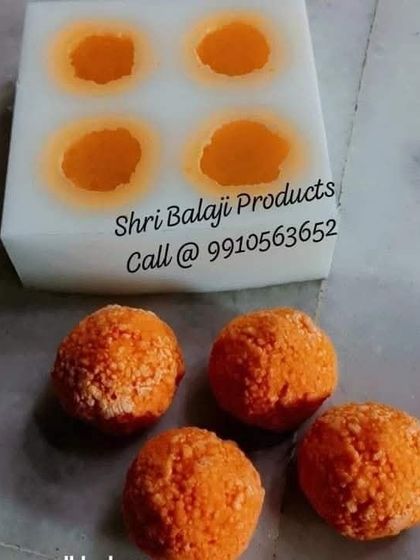 My 4-in-1 Ladoo mold shown with the resulting realistic boondi ladoo candles. The texture achieved with this mold is exceptional, giving a very authentic look.