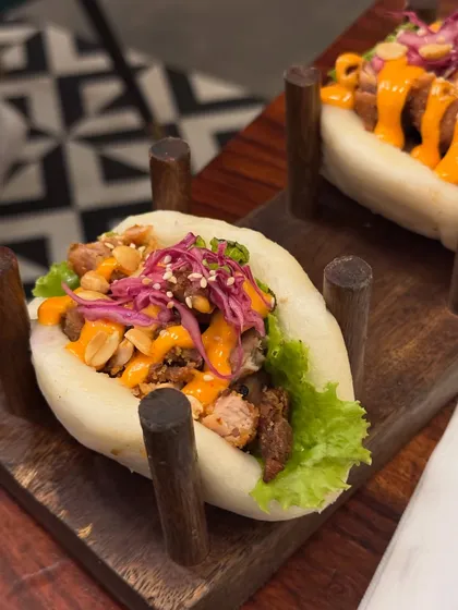 A photo of delicious bao buns from a reunion with a dear friend. I often weave personal stories about friendship and life into my food posts.