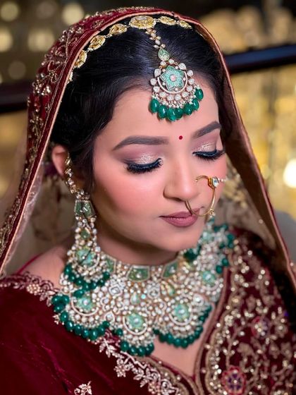 Another angle of this bold bridal look, with eyes closed to show the seamless blending of the eyeshadow and the subtle shimmer on the lid.