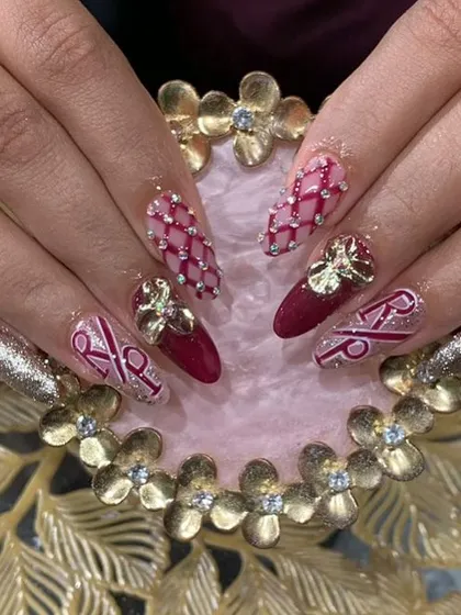 A highly personalized set with initials, a quilted pattern with rhinestones, and large gold 3D charms on a deep red and glittery base.