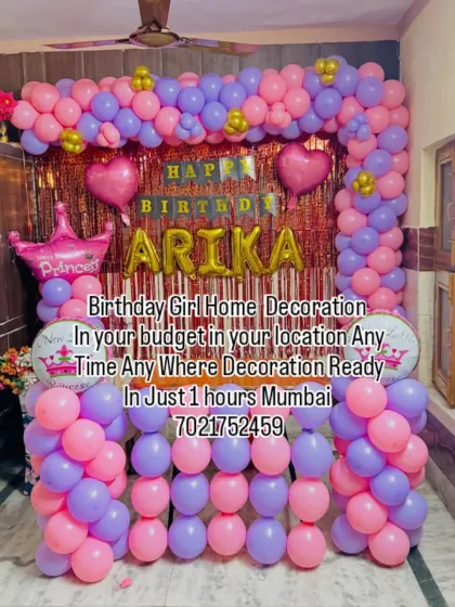 A lovely pink and purple home decoration for a birthday girl. This setup features a shimmer backdrop, a personalized name banner for Arika, and a princess crown foil balloon to make her feel special.