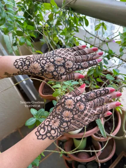 A stunning full-hand design packed with lotus flowers, perfect for a floral theme.