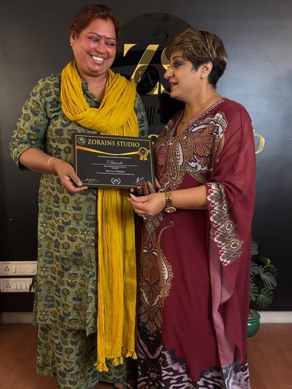 A proud moment for this graduate. Congratulations.