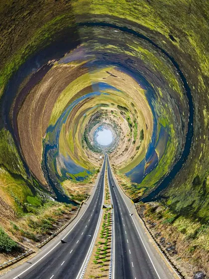 An abstract "tiny planet" edit of the Mumbai-Agra Highway near Nashik. This creative technique transforms a familiar landscape into a unique piece of art.