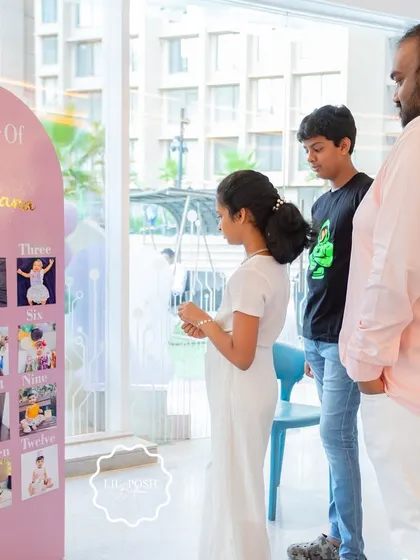 A "One Year of Aahana" milestone board, beautifully designed to showcase photos from her first year.