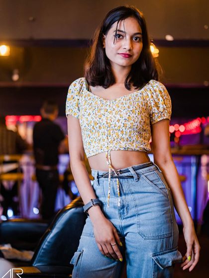 A guest posing at the bar.