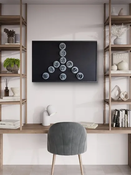 Another view of the 'Peace' artwork, this time in a home office with natural wood shelves. It creates a space that feels both productive and serene.