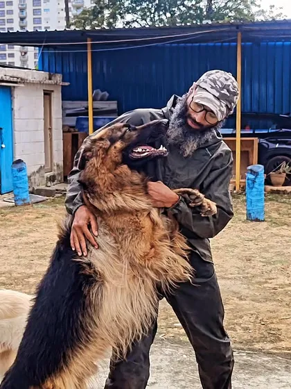 Getting a big hug from this gentle giant. Every pet that comes here is family, and we make sure they get all the one on one affection they need.