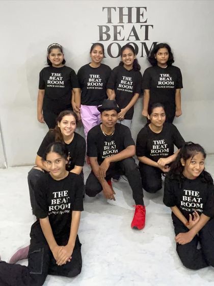 Our advanced batch posing with their instructors. These students are dedicated, talented, and an integral part of our studio's spirit.