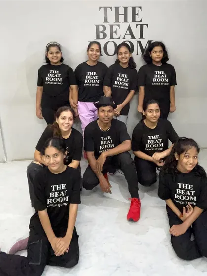 Our advanced batch posing with their instructors. These students are dedicated, talented, and an integral part of our studio's spirit.
