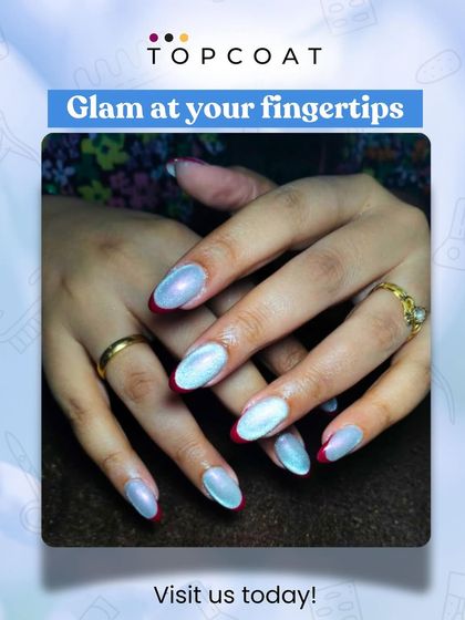 Glam at your fingertips. This design features an iridescent, pearly white polish with a reverse French tip in a bold red for a striking contrast.