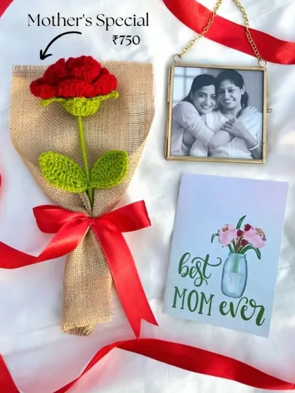 A simple and special gift for Mother's Day. This set includes a single red crochet rose in rustic wrapping, a 'Best Mom Ever' card, and a beautiful hanging photo frame.