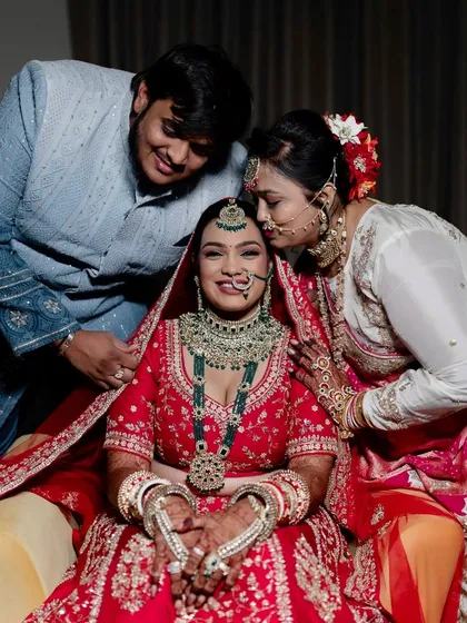 Another beautiful family photo. The bride's makeup is designed to be long-lasting and picture-perfect, capturing the emotions of the day.